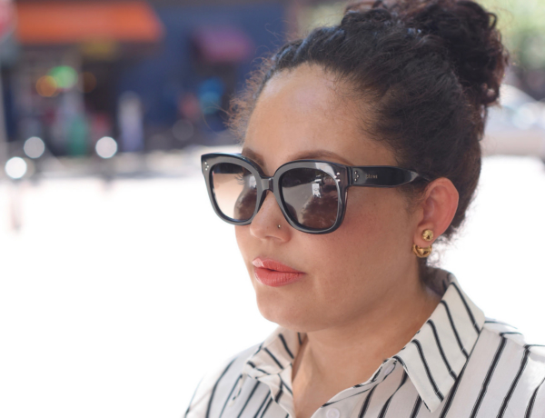 Tanesha Awasthi (formerly known as Girl with Curves) wearing a stripe top and Celine sunglasses.