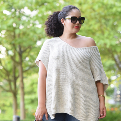 Tanesha Awasthi (formerly known as Girl with Curves) wearing an off the shoulder sweater.