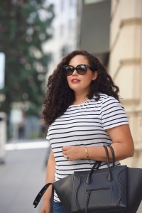 Tanesha Awasthi (a Girl With Curves) wearing a stripe tee, skinny jeans and espadrille wedge sandals in Seattle