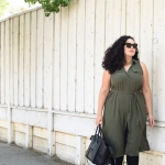 Tanesha Awasthi, also known as Girl With Curves, wearing a plus size shirtdress, leggings, Celine phantom, Celine sunglasses and orange lipstick.