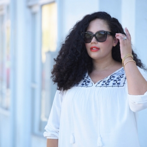 Tanesha Awasthi, also known as Girl with Curves, wearing a swing blouse and Celine sunglasses.