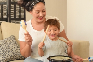 Tanesha Awasthi, also known as Girl With Curves, shares her family's favorite evening activity, bonding and developing her toddler's learning and language skills through music.