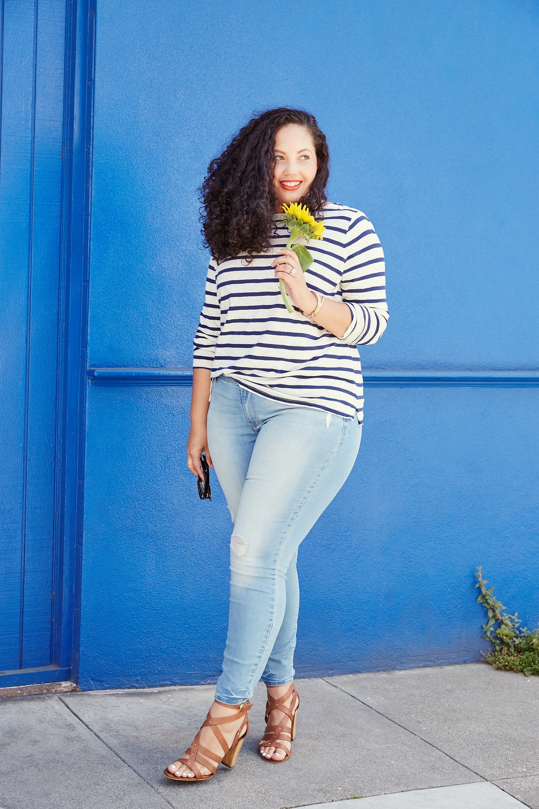 Tanesha Awasthi (also known as Girl With Curves) stars in Old Navy denim campaign wearing a stripe tee and skinny jeans in San Francisco CA.