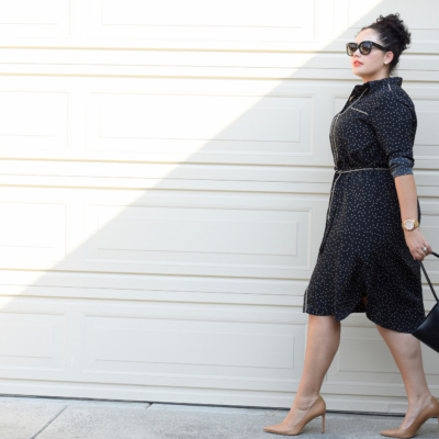 Tanesha Awasthi, also known as Girl With Curves, wearing a pajama-inspired midi dress, nude pumps and oversized tote bag.