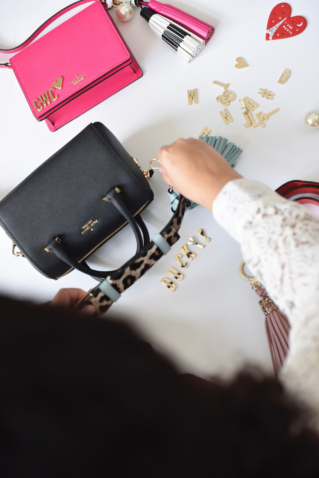 Girl With Curves blogger Tanesha Awasthi personalizes kate spade new york handbags.
