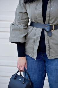 Girl With Curves blogger Tanesha Awasthi wears a belted utility jacket.