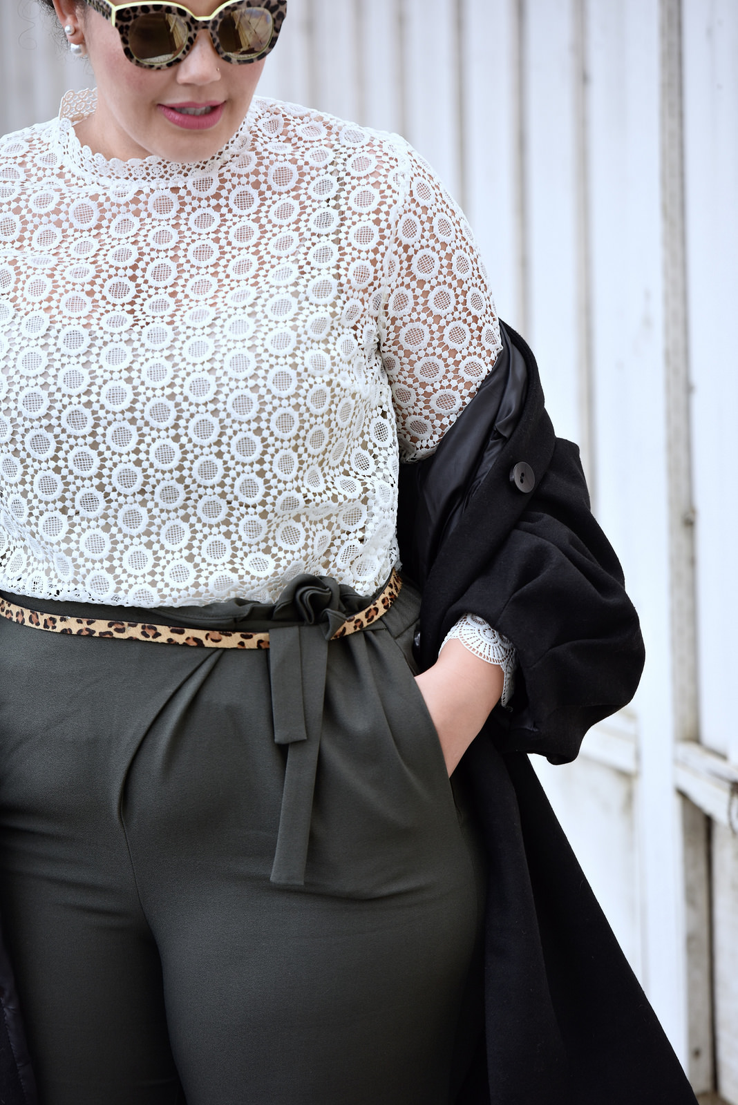 Girl With Curves blogger Tanesha Awasthi wearing an H&M lace blouse.