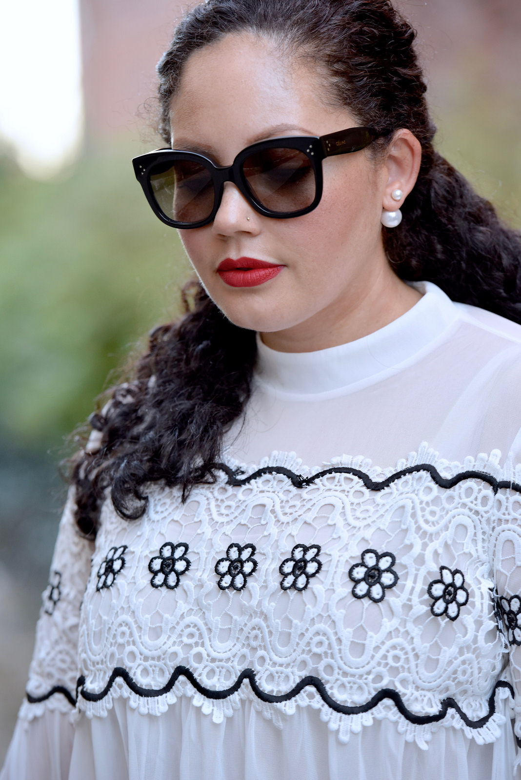 Girl With Curves featuring Celine sunglasses and Asos lace blouse, with Nars red lipstick.
