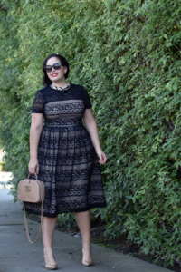 Girl With Curves wearing a pearl necklace from Ann Taylor, Audrey Sunglasses from Celine and Maggy London Lace Dress from Nordstrom.