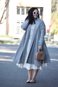 Girl With Curves featuring a grey trapeze coat from Asos, Ruffle Sweater from Asos, White Midi Skirt from Asos, Flats from Sole Society and Chanel Bag.
