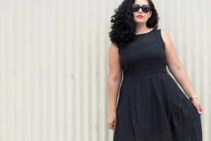 Girl With Curves wearing a gingham black dress from Nordstrom.