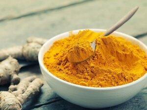 Girl With Curves - Turmeric In A Bowl