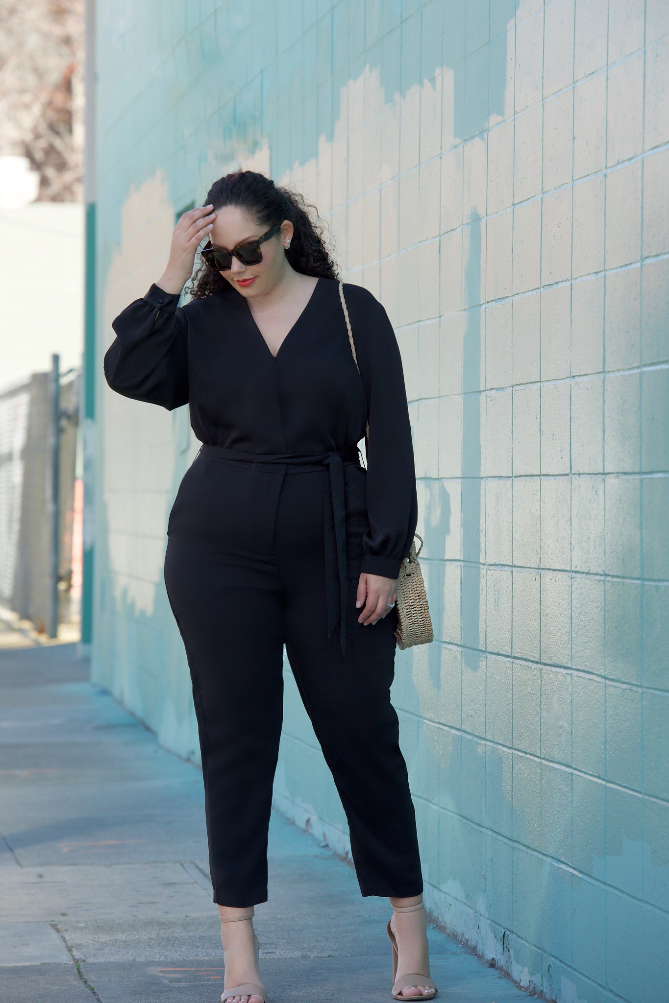 This $23 Jumpsuit Looks Amazing on Curves via Girl With Curves #curvyfashion #plussize #bodypositive